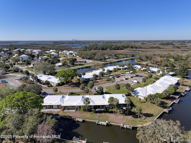 aerial view with a residential view and a water view