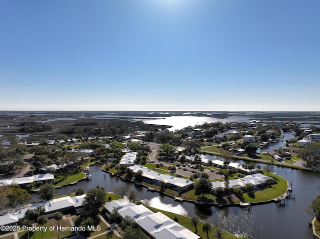 bird's eye view with a water view and a residential view