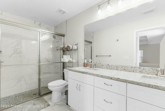 full bath featuring toilet, a stall shower, visible vents, and a sink