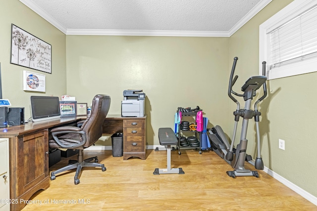 home office with crown molding, wood finished floors, baseboards, and a textured ceiling