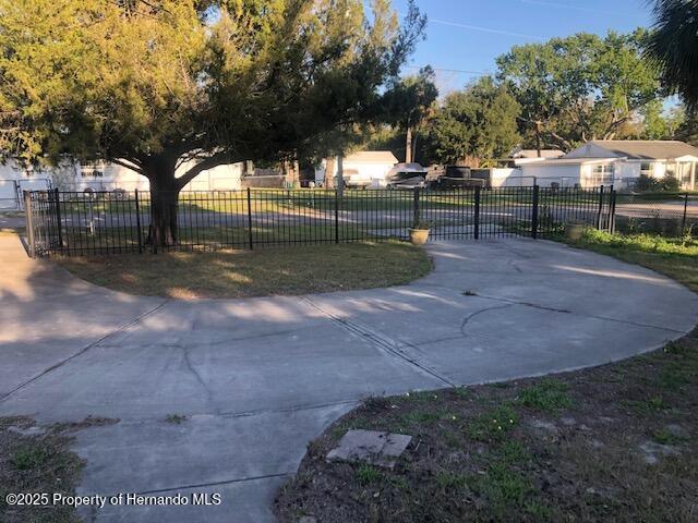 surrounding community featuring fence