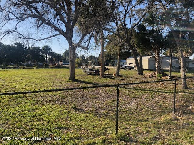 view of yard with fence