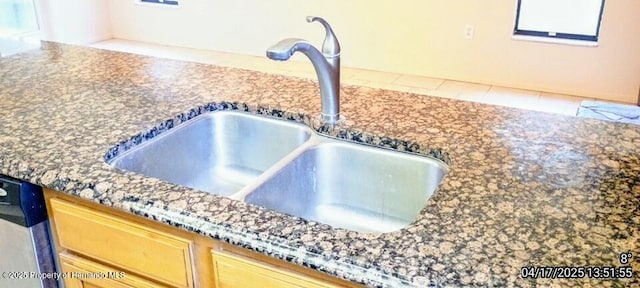 12437 Drayton Dr, Spring Hill, FL 34609 - details with dishwasher, dark stone countertops, and a sink