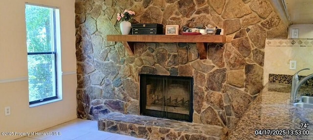 12437 Drayton Dr, Spring Hill, FL 34609 - interior details featuring a stone fireplace