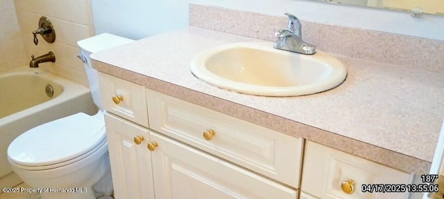 12437 Drayton Dr, Spring Hill, FL 34609 - bathroom with vanity and toilet