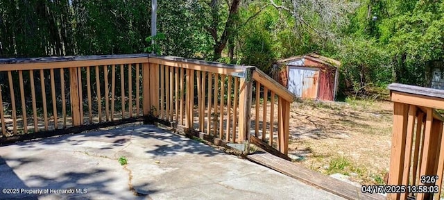 12437 Drayton Dr, Spring Hill, FL 34609 - deck with an outdoor structure and a shed