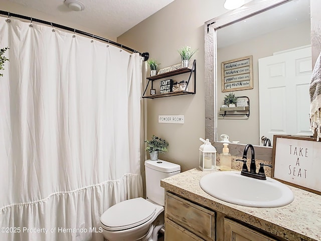 full bathroom featuring toilet and vanity