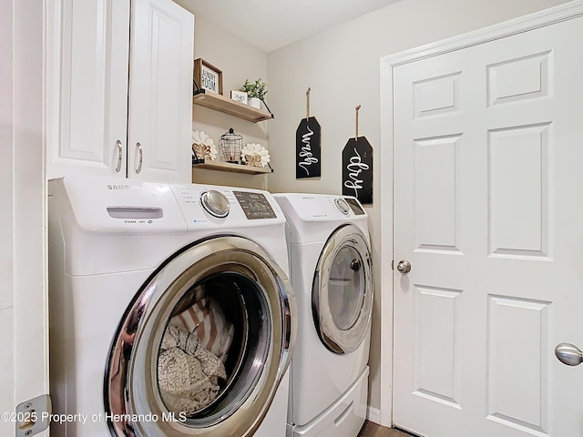 laundry room with cabinet space and independent washer and dryer