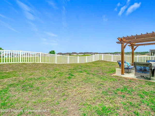 view of yard featuring a patio, a fenced backyard, and a pergola