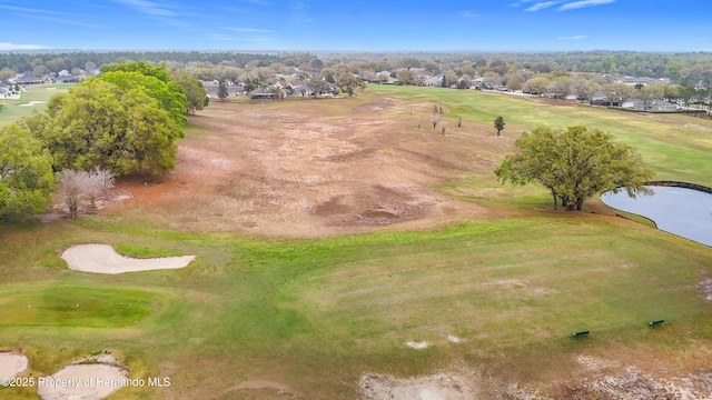 birds eye view of property with view of golf course