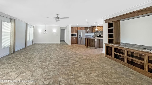 unfurnished living room with crown molding, recessed lighting, baseboards, and ceiling fan