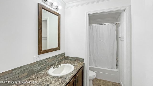 full bathroom with shower / bath combo with shower curtain, toilet, vanity, and crown molding