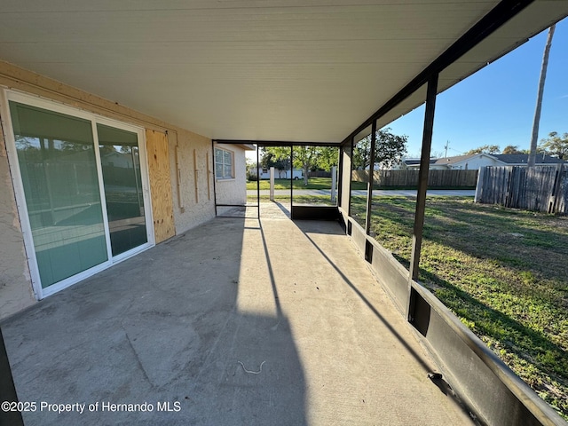 view of patio featuring fence