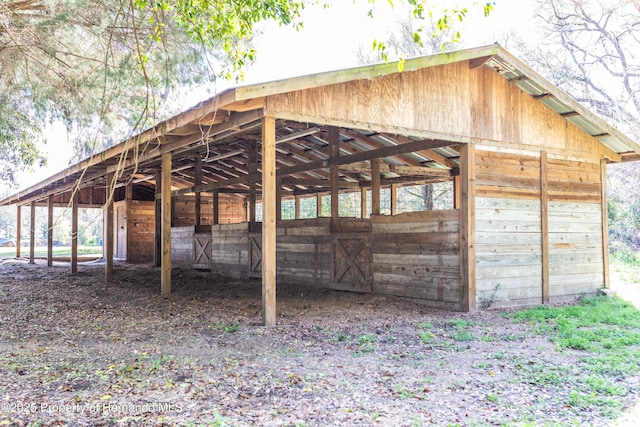 view of outbuilding with an outbuilding and a carport