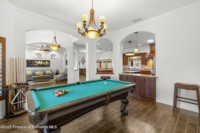 recreation room with visible vents, pool table, crown molding, and wood tiled floor