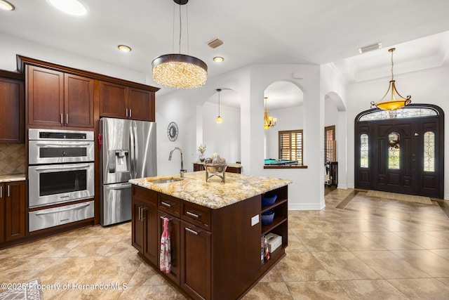 kitchen featuring visible vents, open shelves, a sink, appliances with stainless steel finishes, and a warming drawer