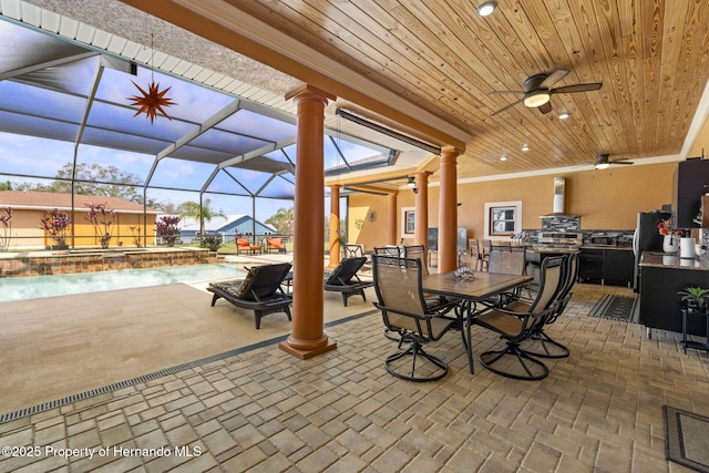 view of patio with outdoor dining space, a jacuzzi, a lanai, an outdoor pool, and ceiling fan