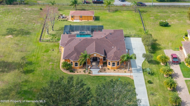 birds eye view of property featuring a rural view