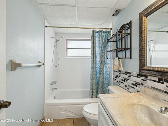 full bath featuring visible vents, toilet, shower / bath combination with curtain, tile patterned flooring, and vanity