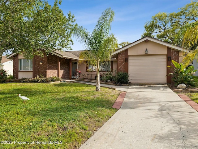 single story home featuring driveway, a front lawn, and an attached garage