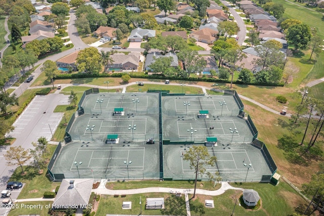 birds eye view of property with a residential view