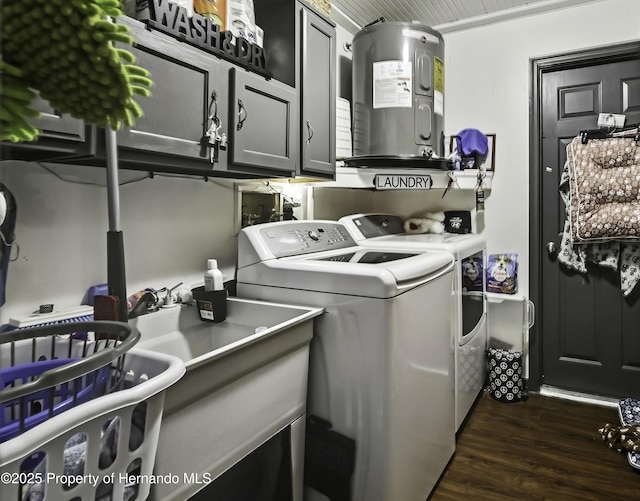 laundry area with cabinet space, dark wood-style floors, washing machine and dryer, and electric water heater