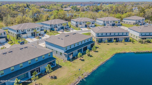 aerial view featuring a residential view and a water view