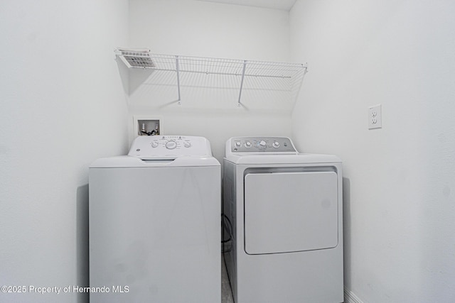 laundry area with laundry area and washer and dryer