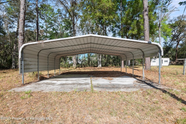 view of parking / parking lot with a carport