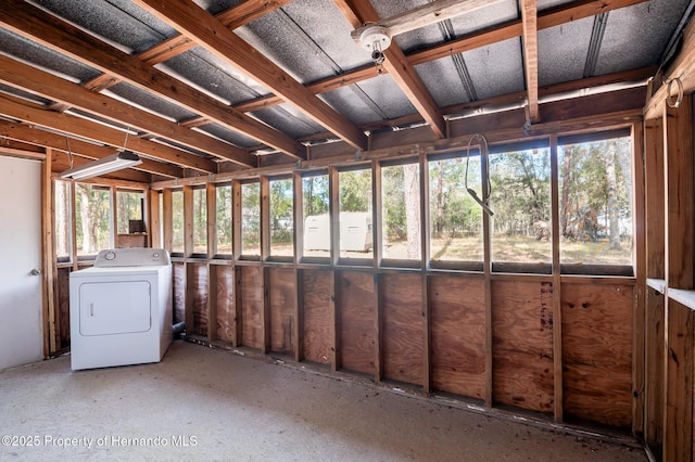 unfurnished sunroom with washer / clothes dryer