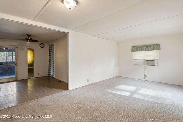 carpeted empty room with cooling unit and ceiling fan