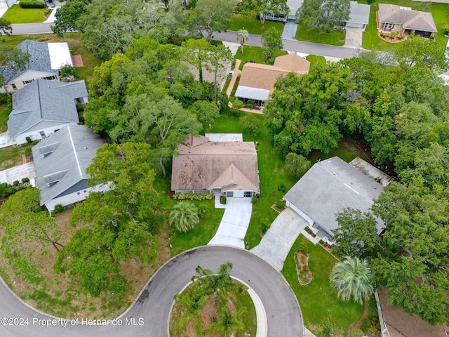 birds eye view of property with a residential view