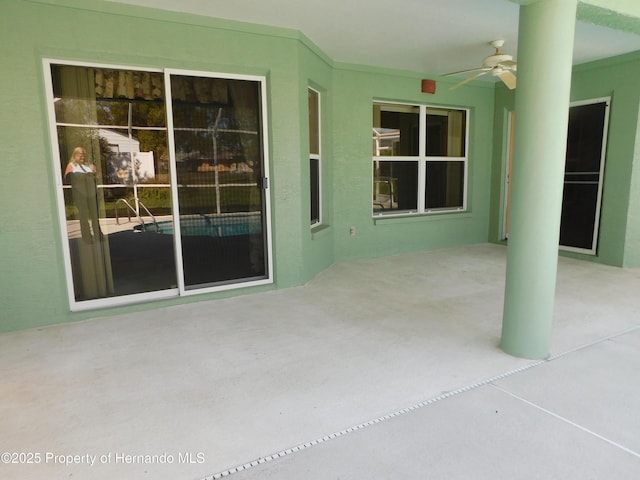 view of patio / terrace featuring a ceiling fan