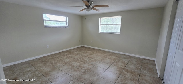 16402 Killearn Ln, Spring Hill Pasco, FL 34610 - empty room featuring healthy amount of natural light, ceiling fan, baseboards, and tile patterned flooring