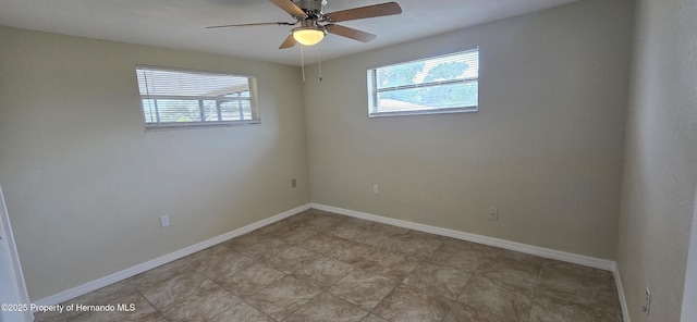 16402 Killearn Ln, Spring Hill Pasco, FL 34610 - spare room featuring plenty of natural light, ceiling fan, and baseboards