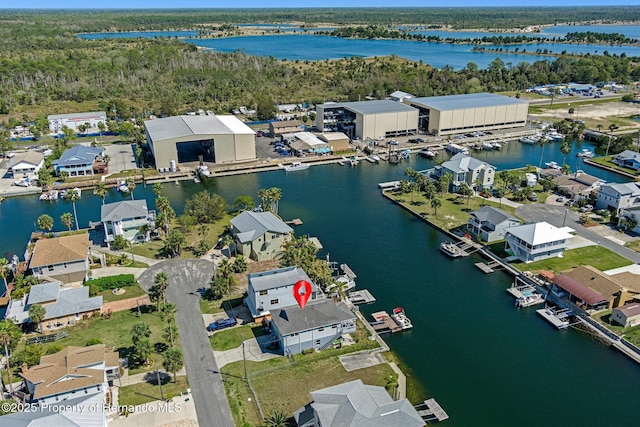 aerial view featuring a water view and a residential view