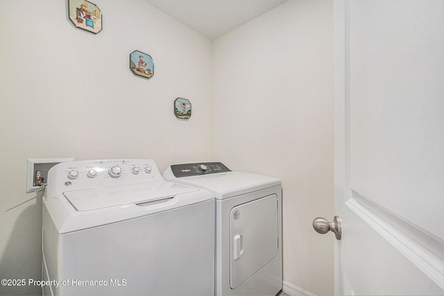 laundry area featuring laundry area and washer and dryer