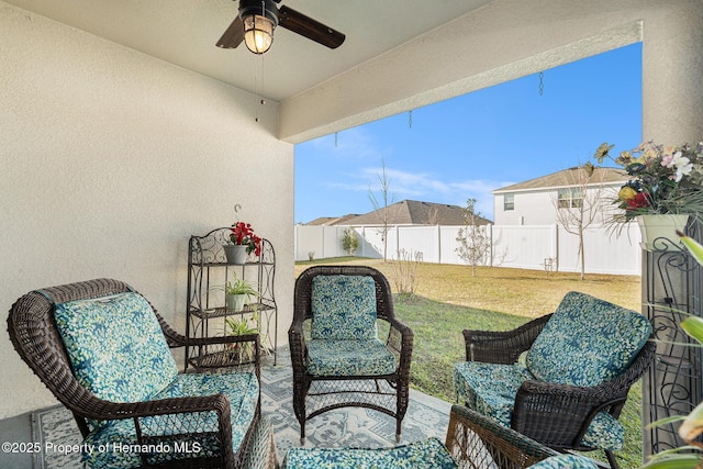 view of patio with a ceiling fan and a fenced backyard