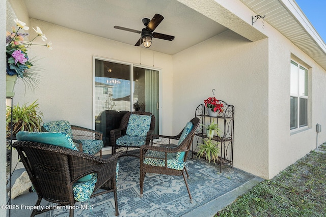 view of patio / terrace featuring ceiling fan