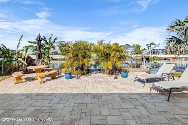 view of patio / terrace featuring a water view