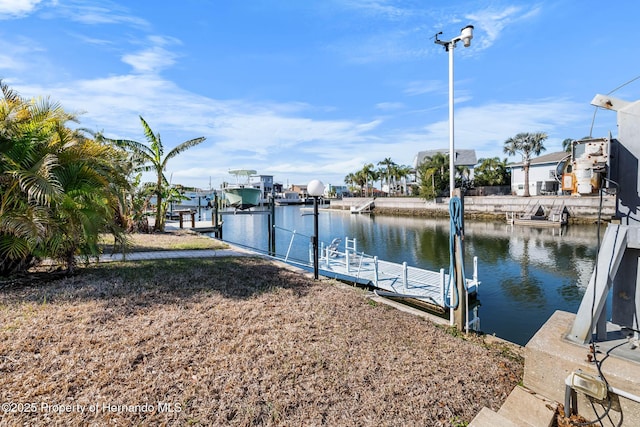 dock area featuring a water view