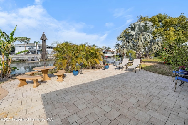 view of patio / terrace featuring a water view