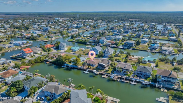 aerial view featuring a residential view and a water view