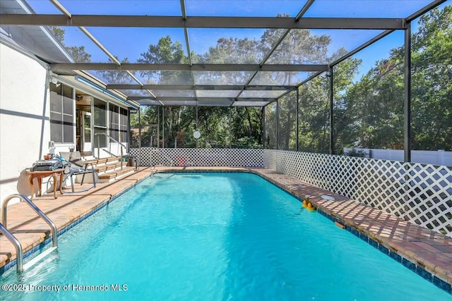 view of swimming pool with a patio area and a fenced in pool