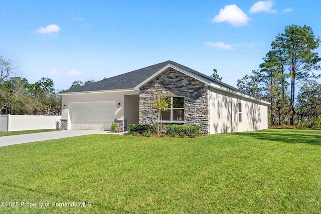 view of front of home featuring stucco siding, driveway, fence, a front yard, and a garage