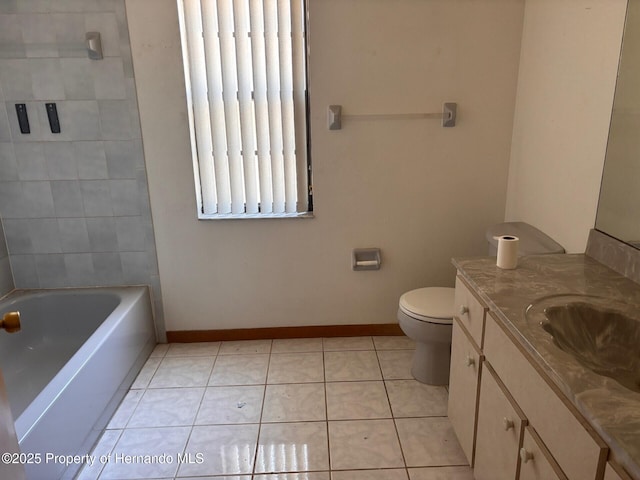 13935 Linden Dr, Spring Hill, FL 34609 - full bathroom with vanity, baseboards, tile patterned floors, and toilet