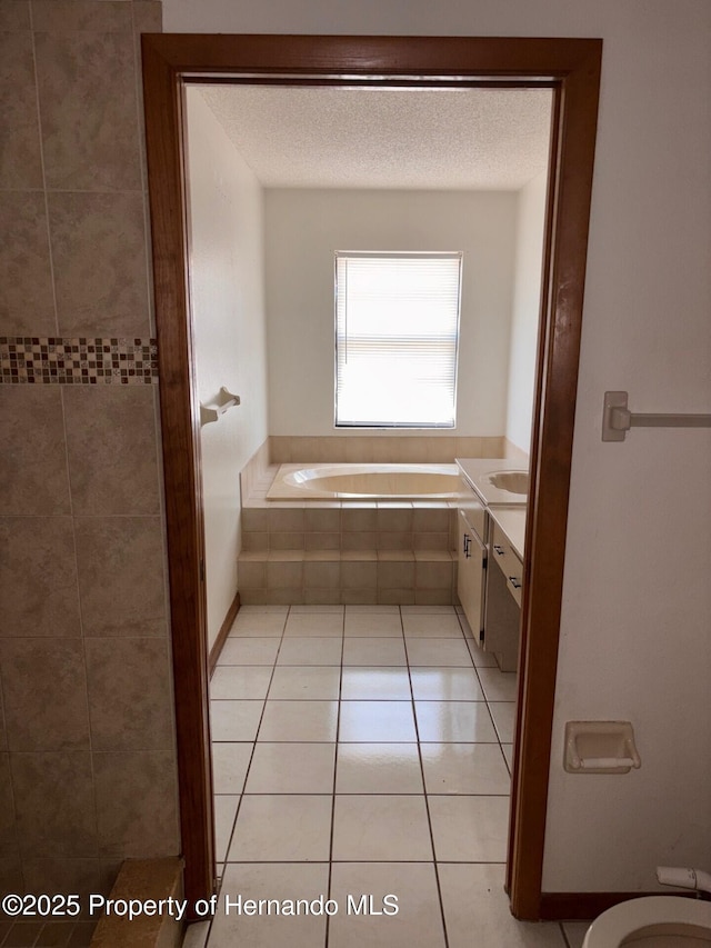 13935 Linden Dr, Spring Hill, FL 34609 - full bath with a garden tub, tile patterned floors, and toilet