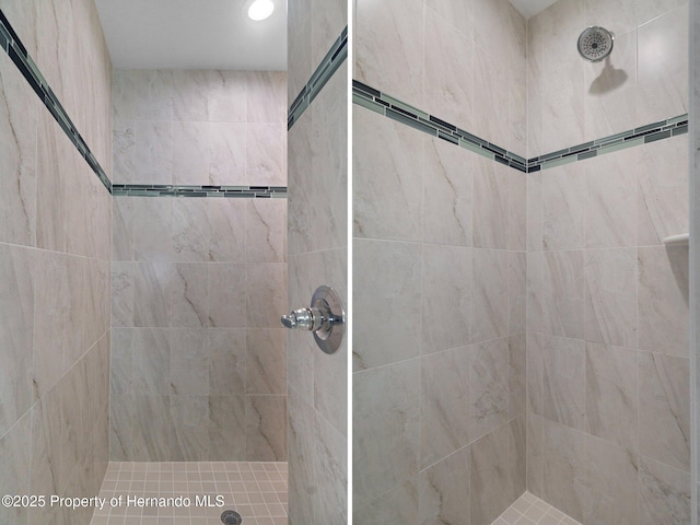 bathroom featuring tiled shower