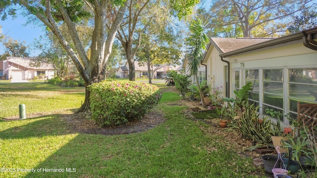 view of yard featuring a residential view