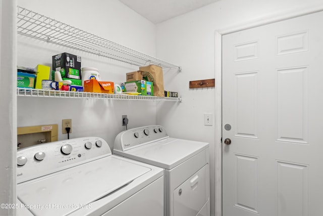 laundry area with laundry area and washer and dryer